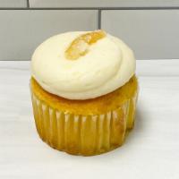 Gf Lemon Cupcake · GF lemon cake filled with lemon curd and topped with cream cheese icing and a candied lemon ...