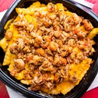 Crawfish Fries · Fries topped with cheese and crawfish tails.