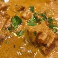 Lamb / Goat Tikka Masala (Gf) · Choice of lamb or goat cooked in rich creamy tomato sauce with onion and bell peppers