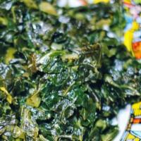 Gomen · Chopped & seasoned collard greens, jalapeno peppers, cooked with onions, garlic.