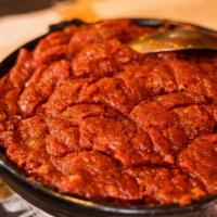 Kitfo · Special (minced mid-rare or well done lean beef) seasoned with herbed butter and spices - wi...