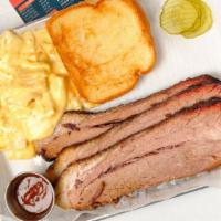 Brisket · Served with one small side and salad.