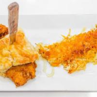 Chicken Biscuit · Knife and fork version of our hand-breaded chicken breast on a scratch buttermilk biscuit wi...