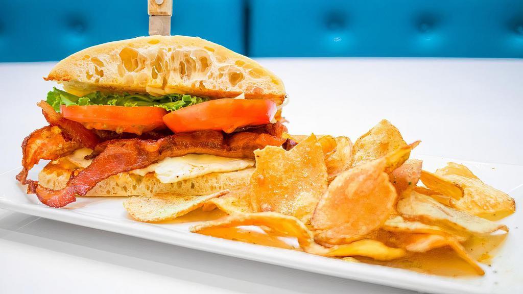 Fried Egg Blt · Our thick cut bacon, Monterey jack cheese, butter lettuce, tomato, mayo and an over medium egg on ciabatta.