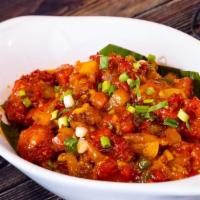 Chicken Manchurian · Boneless chicken marinated with spices, deep fried, and tossed in manchurian sauce.