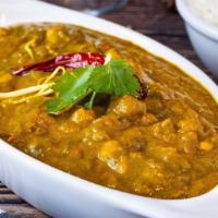 Gongura Curries · Chicken/Goat curry cooked with spices and Gongura leaves (These edible leaves are used in So...