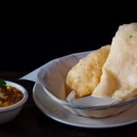 Chana Bhature · A combination of Channa masala (white chickpeas curry) and Bhatura, a fried bread made from ...