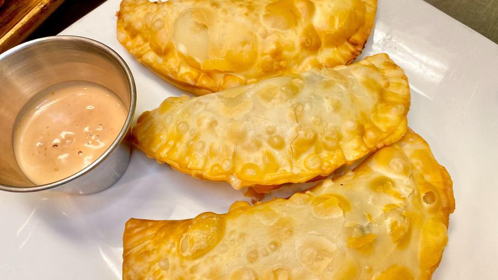 Empanadas (3 Pieces) · Favorite. Crunchy empanadas filled with either chicken, beef, shrimp, veggies, or cheese and green onions! Three pieces per order or five pieces platter (one of each).