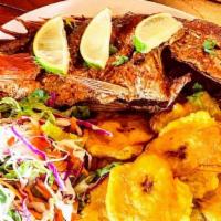 Pescado Entero Frito / Whole Fried Fish · Enjoy our perfectly seasoned whole fried red snapper served with your choice of side and a s...
