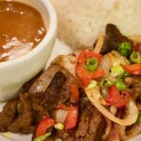 Bistec Encebollado / Pan Seared Beef Steak · Favorite. Dominican style pan seared beef steak sauteed onions and bell peppers served with ...