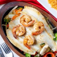 Fajitas Del Mar · Shrimp and grouper fillet, served steaming hot on a bed of zucchini, broccoli, cauliflower, ...