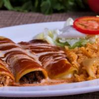 Enchiladas Supremas · One chicken enchilada, one beef enchilada, and one cheese enchilada, all smothered with a fr...