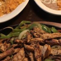 Grilled Chicken Fajitas · A sizzling serving of grilled chicken.

*May be cooked to order. Consuming raw or undercooke...