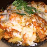 Tandoori Chicken Poutine · Tandoori chicken, makhani sauce, kenny's cheese curds, masala fries.