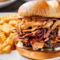 Smokehouse Burger · A grande size burger topped with bacon and shredded beef brisket, layered with jalapeño-BBQ ...