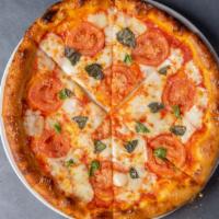 Margherita Pizza · tomato, buffalo mozzarella and basil
