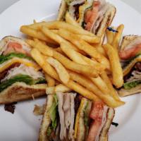 Turkey Club · Smoked turkey, bacon, cheddar, provolone cheese, lettuce, tomato, mayonon choice of toasted ...