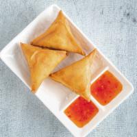 Sambusa · Three crispy treats stuffed with your choice of minced beef, chicken or lentils.