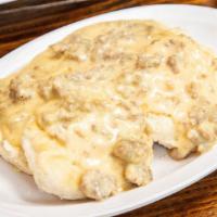 Biscuits & Gravy · 2 delicious biscuits covered in sausage filled white gravy