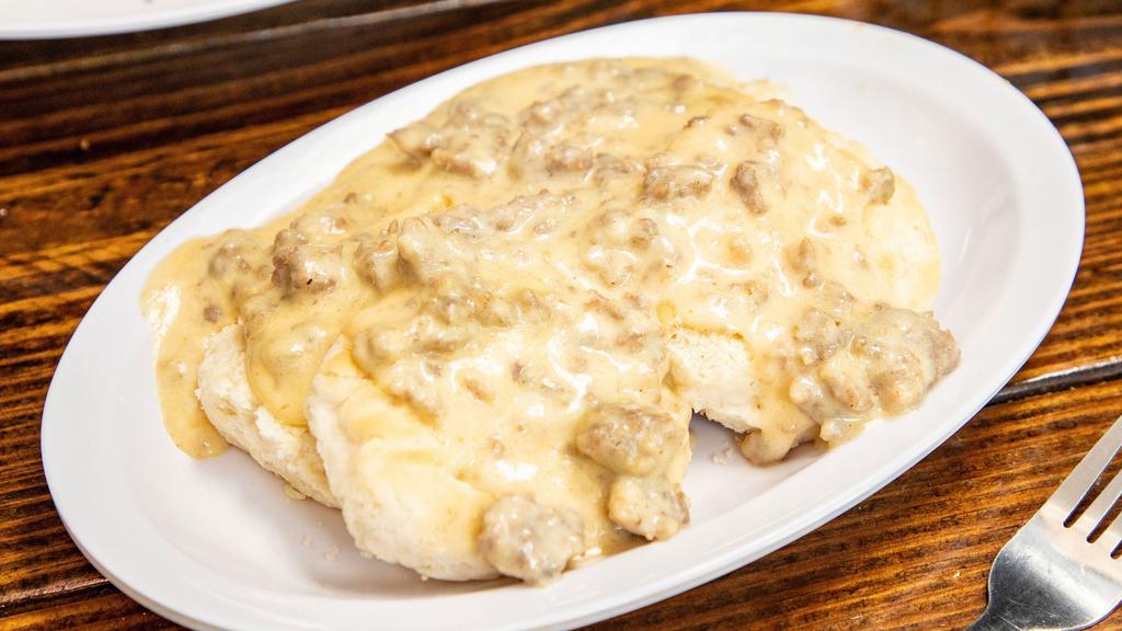 Biscuits & Gravy · 2 delicious biscuits covered in sausage filled white gravy