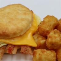 Biscuit Egg Cheese W/Bacon Or Sausage · Artisan Biscuit with egg, cheese and bacon