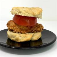 Sweet Chicken Biscuit · house-made biscuit, fried breaded chicken, thick sliced tomato, honey drizzle