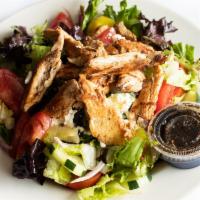 Grilled Chicken Salad · Marinated, grilled chicken over a bed of romaine lettuce with red onions, feta cheese, peppe...