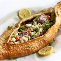 Greek Fatayer · Fresh spinach, chopped roma tomatoes, red onions, kalamata olives, Greek feta cheese and fre...