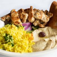 Chicken Gyro Platter · Chicken shaved off the rotisserie and grilled, served over a bed of sliced bell peppers, oni...
