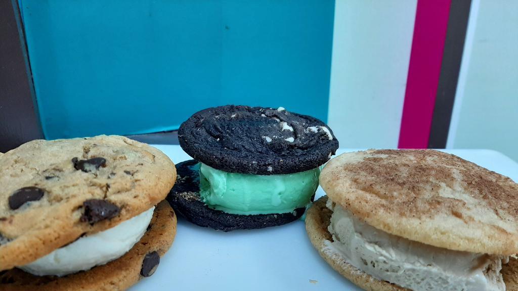 Ice Cream Sandwich · Two fresh baked cookies with a scoop of homemade ice cream in between.