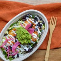 Bajo Bowl · Superfood lettuce blend tossed in olive oil, lime juice dressing, cilantro rice, black beans...