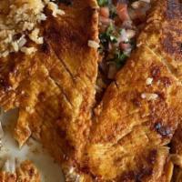 Pollo Asado · A 10 oz chicken breast seasoned and with a hint of orange for a juicy flavor. Served with pi...