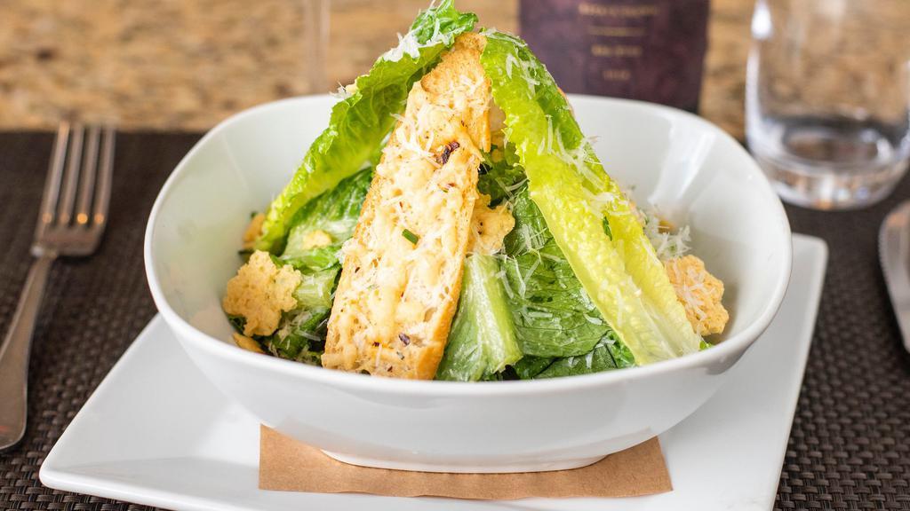 Caesar Salad · Parmesan croutons.