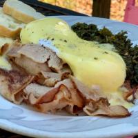 Root Benny · Two farm-fresh poached eggs, local seasonal greens, local ham from Rabbit Ridge, topped with...