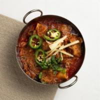 Mutton Karahi · Spicy, homestyle mutton curry with fragrant spices and fresh ginger.