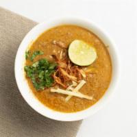 Goat Haleem · Combination of goat, lentils and grains, slow cooked, and garnished with fried onions, ginge...