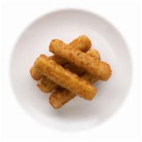 Mozzarella Sticks · Five pieces. Deep-fried breaded crispy sticks loaded with cheese inside.