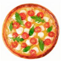 Small White Pizza And Wings · Fresh basil mixed with creamy ricotta and mozzarella, garnished with garlic, on olive oil ba...