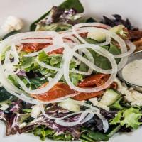 Lafayette'S House Salad · Mesclun mix, roasted tomatoes, chopped cucumber, shaved vidalia onion, feta cheese, choice o...