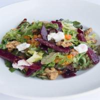 Beet And Orange Salad · Mesclun mix, arugula, sliced beets, Mandarin oranges, goat cheese, and candied walnuts tosse...