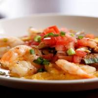 Shrimp And Grits · Mississippi Stone-Ground grits, andouille sausage, shiitake mushrooms, grape tomatoes.