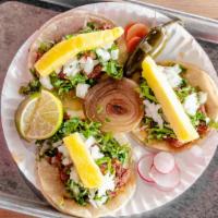Tacos · Served in corn tortilla. Add preparation for an additional charge. Add cheese for an additio...