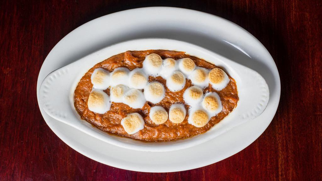Sweet Potato Casserole · Sweet potatoes blended with butter, cream, and brown sugar. Topped with marshmallows and toasted.