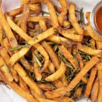 Rosemary Fries · Home-cut potatoes fried with fresh rosemary and seasoning.