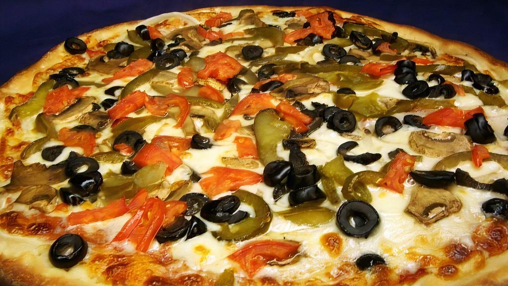 Medium Vegetarian Pizza · Extra cheese, mushrooms, diced tomatoes, black olives, sweet peppers and onions.