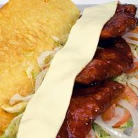 Half Buffalo Chicken Sub · Chicken fingers dipped in your choice of wing sauce with ranch or bleu cheese, lettuce, toma...