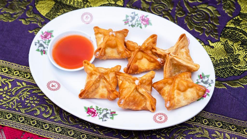 Crab Delight (6 Pieces) · Crispy wontons filled with cream cheese, scallion, and imitation crab.  Served with sweet and sour sauce.