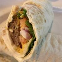 Cheese Burger Bob Wrap · Our take on a burger! Kubideh, Persian style ground beef grilled on a skewer over an open fl...