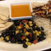 Southwest Chicken Platter · Saffron marinated all natural grilled chicken served over basmati rice with our homemade bla...
