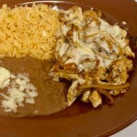 Pollo A La Crema · Strips of chicken breast soaked with onions and a delicious creamy Parmesan Mexican cheese s...